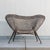 An exceptional sculptural lounge chair attributed to French artist and metalworker Raymond Moralès (1926–2004), featuring...