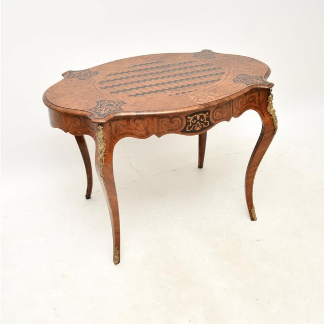 An absolutely exquisite antique French inlaid bureau plat desk. This was made in France, it dates from around the...