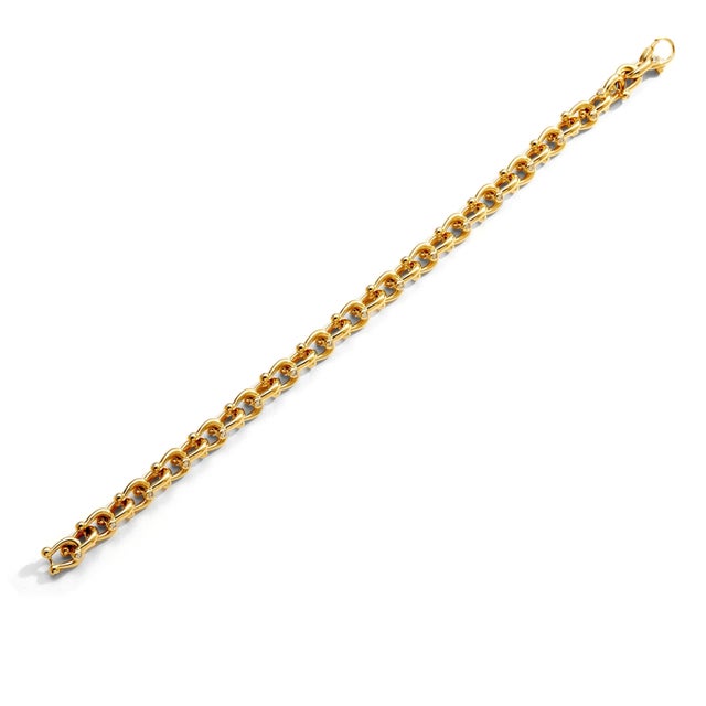 Created in 18 karat yellow gold Diamonds 1.30 carats approx. 8 inch length with lobster clasp Bracelet can be clasped at...