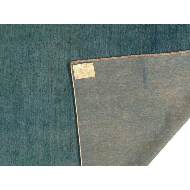 Hand knotted and meticulously crafted by Pakistani artisans, this stunning O D collection teal color will invite a quality...
