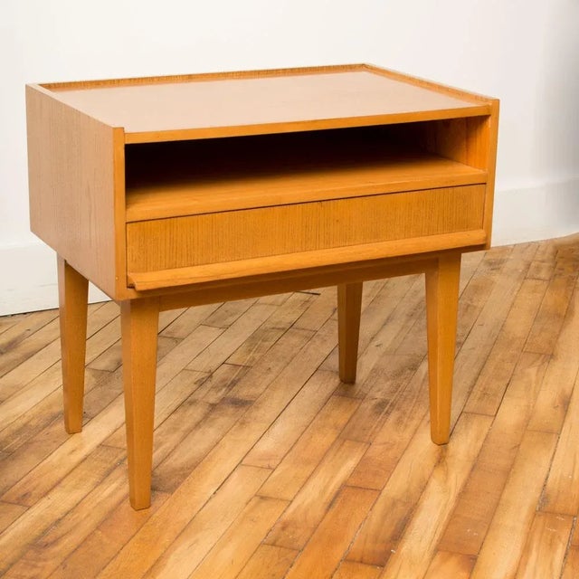 A mid century modern Russel Wright one drawer side cabinet/night stand, circa 1950. Solid maple.