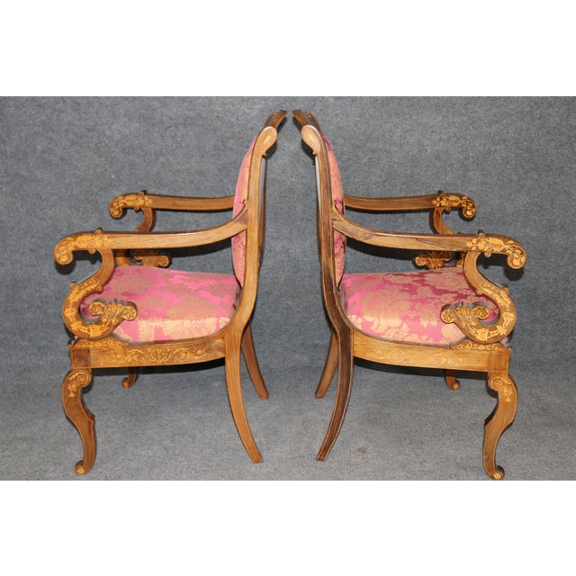 This is a rare and desirable set of 4 Dutch Marquetry walnut armchairs. They date to the 1940-50s era and most likely are...