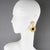 Cilea Paris designed these stunning, dimensional, dangling clip-on earrings. These oversized, floral-inspired, artisanal...