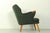 Kurt Olsen lounge chair model 221, manufactured by Slagelse Møbelværk in about 1960. Completely renovated in quality dark...