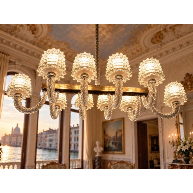 A very elegant Italian chandelier by Ercole Barovier hand blown Murano glass construction using the Rostrato technique...