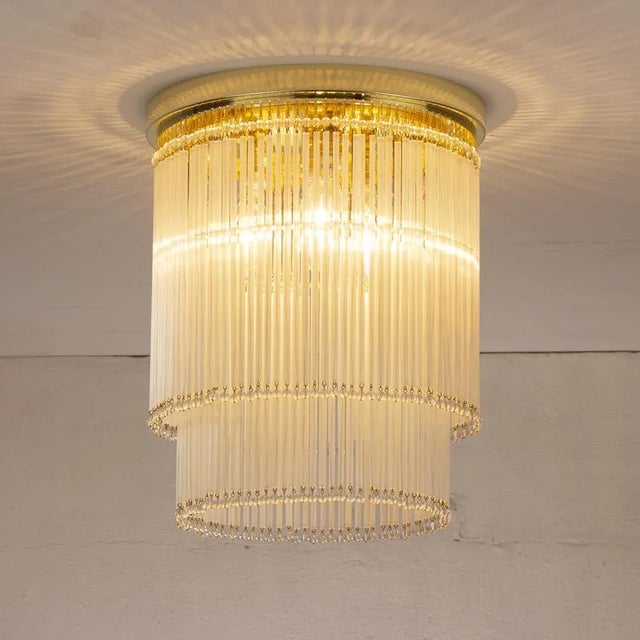 A great classic of italian vintage design and at the same time a magnificent contemporary glass chandelier in murano mid-...