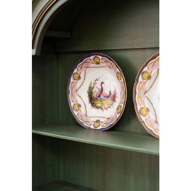 A truly remarkable PAIR of 18th Century French Sèvres Hand Painted Shallow Bowls. Stamped 1755. Polychrome painted with...