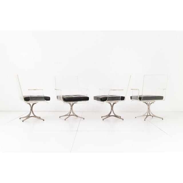 Invisible group flower occasional chairs, designed by Erwine & Estelle Laverne Signed with applied paper manufacturer's...
