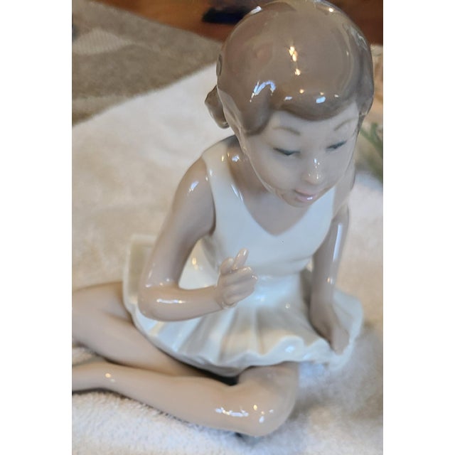 Nao by Lladro backstamp. Artist: Vicente Martinez Issued: 1992 Dimensions: 5.5"L x 4.5"W x 6"H Manufacturer: Nao by Lladro...