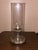 An iconic 12-inch Classic Oil Lamp crafted by the Wolfard Glassblowing Company, complete with a polished multi-tone stone...