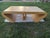 This is a set of 2 post modern pencil reed wood waterfall style end or side tables. These tables are in good condition...