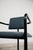 A stunning and exclusive minimalist vintage armchair dating back to the 1980s, a true piece of modern design with an...