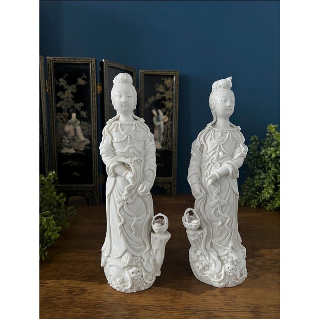 Antique blanc de chine Guanyin statue pair, crafted in luminous white porcelain with exceptional applied beadwork, flowing...