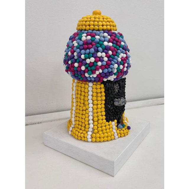 This playful and nostalgic piece from the Fake Candies series captures the spirit of mid-century joy through a hand-...