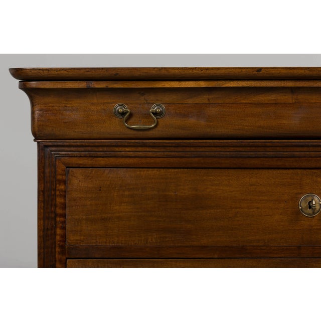 An elegant mid-19th century French Louis Philippe commode, sourced in Provence, France. Hand-crafted from solid walnut,...