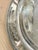 Lovely vintage silverplate tray. Made by International silver company. Features a floral design on the rim. Shows some...