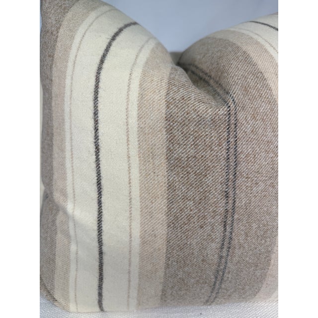 Custom pair of 22" pillows covered in a neutral colored wool stripe fabric. These pillows have tapered corners to prevent...