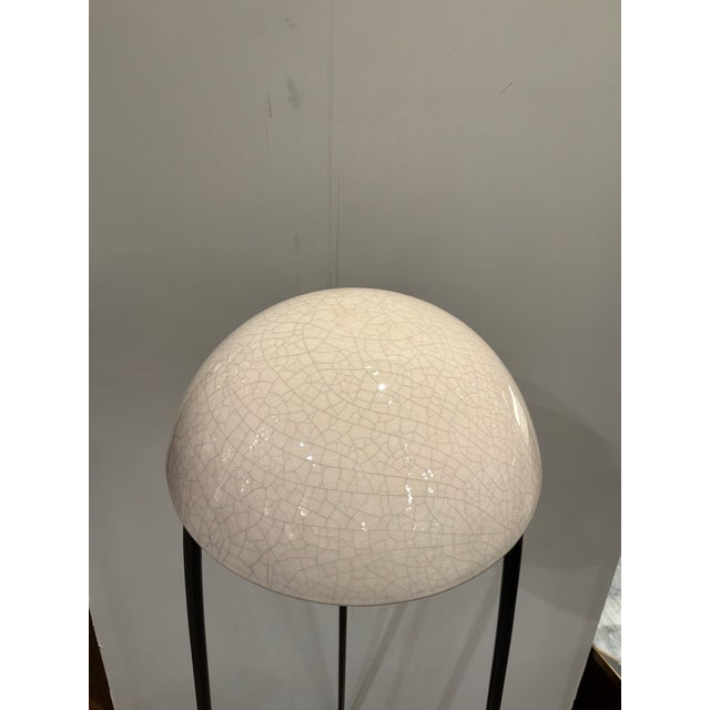 Stylish Arteriors Glaze Floor Lamp. 3 black legs with glazed dome top, glass bottom shade. Original Retail $1680. Showroom...