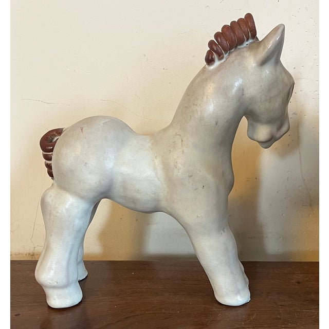1940's Swedish pottery horse by Vicke Lindstrand for Uppsala Ekeby. This mid-century modern ceramic horse figurine was...
