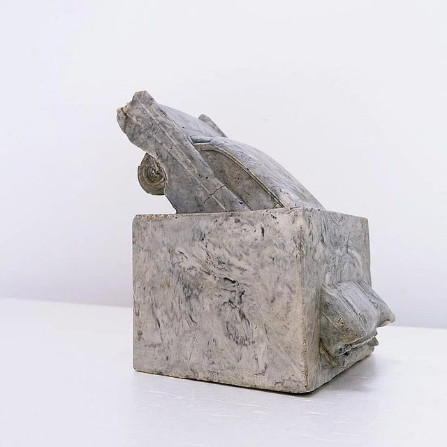 Cast resin sculpture likely inspired by Fernand Flausch's work "The Death of the Automobile" Visual Arts - Cadillac -...