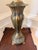 Elegant heavy vintage table lamp with a sculptural urn-form body, raised acanthus leaf detailing, and an antiqued brass...