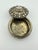Vintage round silver toned box featuring intricate embossed or chased floral designs. This is a pre owned item so please...