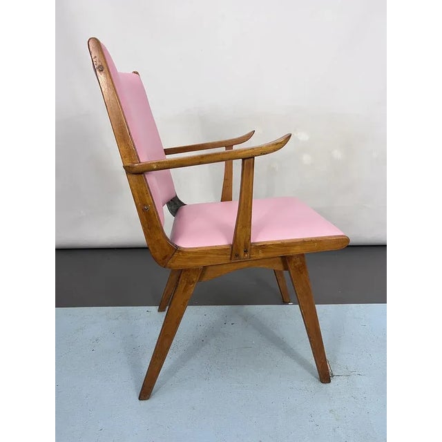 Very good general condition with normal trace of age and use. Re-upholstered in pink smooth leatherette.