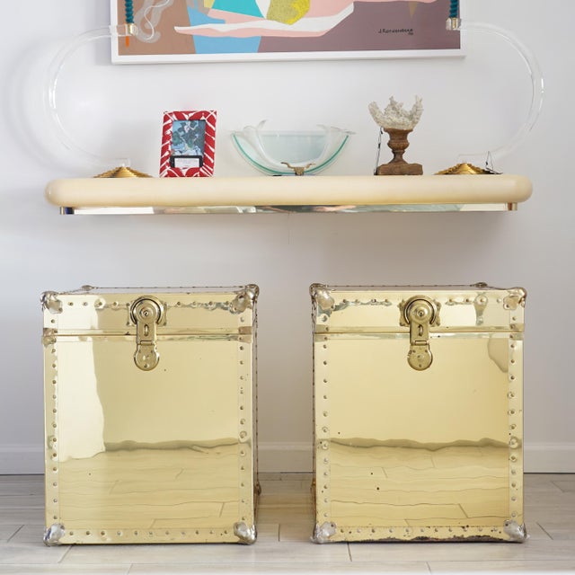 Vintage pair of brass clad trunks circa 1980s. Trunks have functional locks and include keys. These identical trucks would...