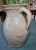 This antique North Carolina salt-glazed stoneware pitcher is attributed to the Craven family of potters. The one-gallon...