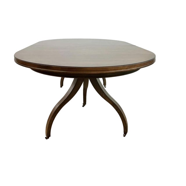 An impressive&nbsp;Hickory Chair Ingold Oval Extension Dining Table, American made and custom produced in ash as part of...