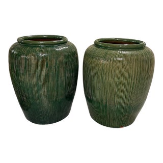 A Pair of Large Mid-Century Modern Ribbed Green Glazed Ceramic Ovoid Planters For Sale