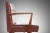 A rare and elegant 1950's walnut armchair, Model 108, designed by Jens Risom for Risom Designs Inc. This collectable chair...