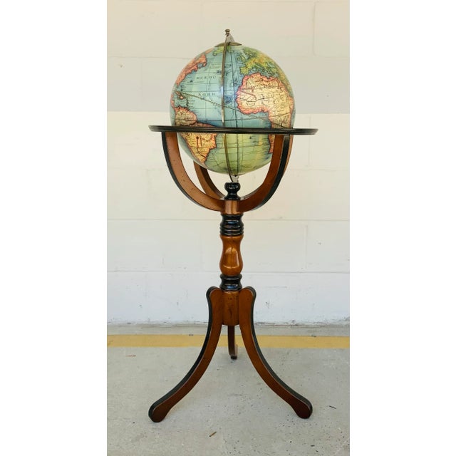 Timeless Library Globe on Stand, warm mahogany finished wood frame with black accents, silver detail, showroom floor sample