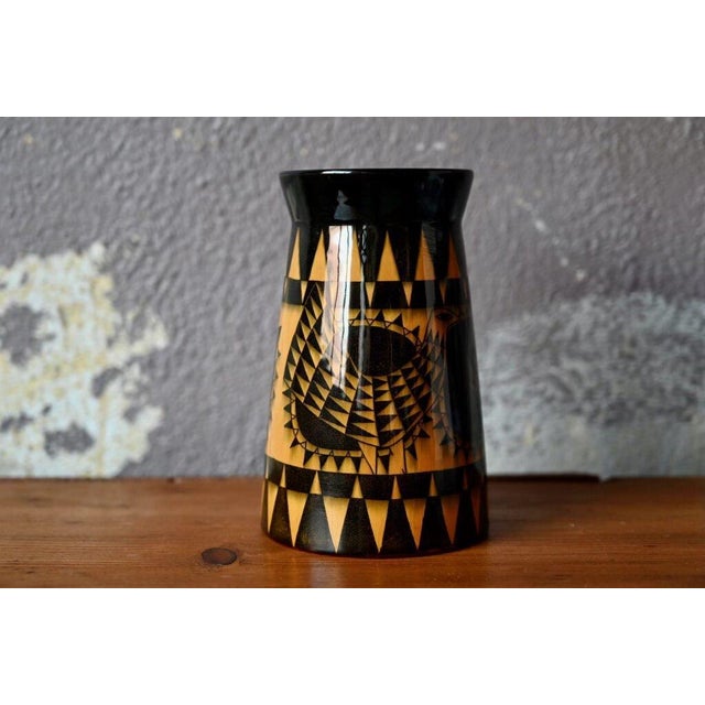 This vase is a Swedish piece from the 1950s, made by the Rörstrand company in Lidköping. A decorative piece of exquisite...