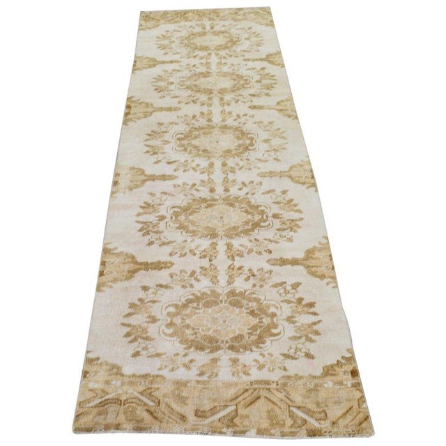 Hand-knotted with care using traditional rug-making techniques, this wool rug blends timeless craftsmanship with a modern...