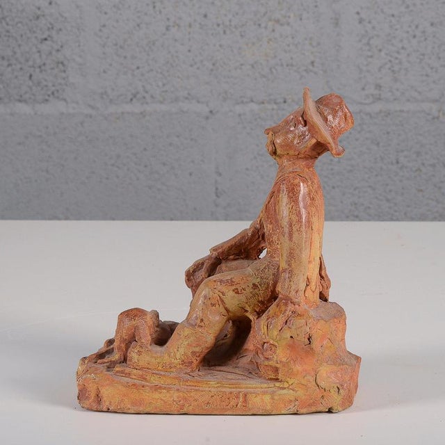 This original vintage figurative sculpture, dated 1953, is a captivating example of mid-century narrative art in...