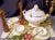 This exceptional vintage 3-piece collection of authentic Bordallo Pinheiro ceramic dinnerware effortlessly captures...
