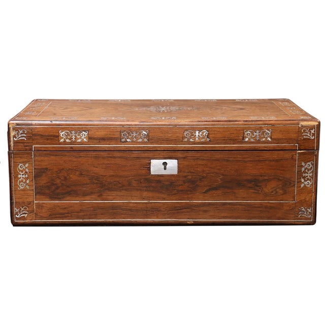 An elegant 19th-century English Regency rosewood writing slope and campaign desk, exquisitely decorated with mother-of-...