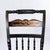 Pair of signed Hitchcock chairs with eagle decorations. Great detail painted and carved onto this piece. Would make a...