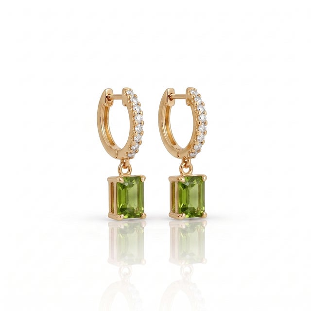 Elevate your daily ensemble with these breathtaking drop huggie hoop earrings featuring a sparkling pavé-set hoop and a...