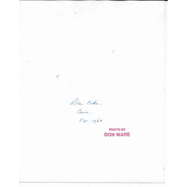 1964 black and white photograph by Los Angeles photographer Don Ware (1921-2006) of Egyptian boats along the shore of the...