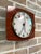 Rare vintage wall clock produced by the historic French company JAZ, featuring a rectangular case with a wood-effect...