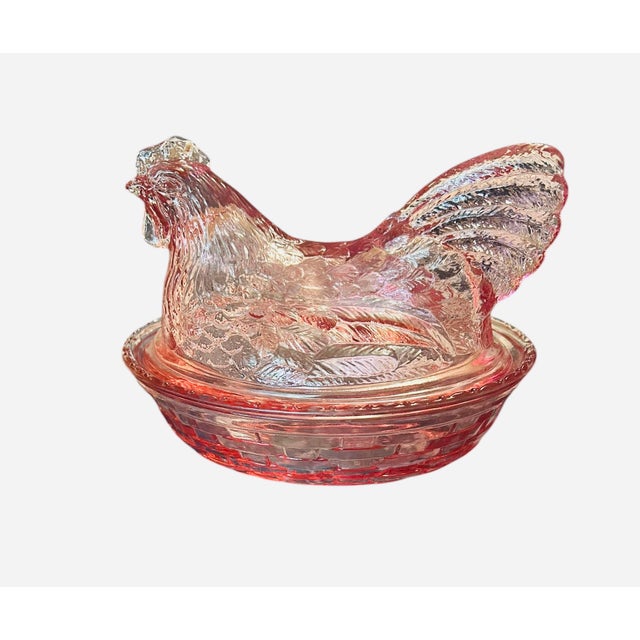 This item is a Longaberger Pink Glass Hen on Nest, manufactured by the L.E. Smith Glass Company in the early 2000s....
