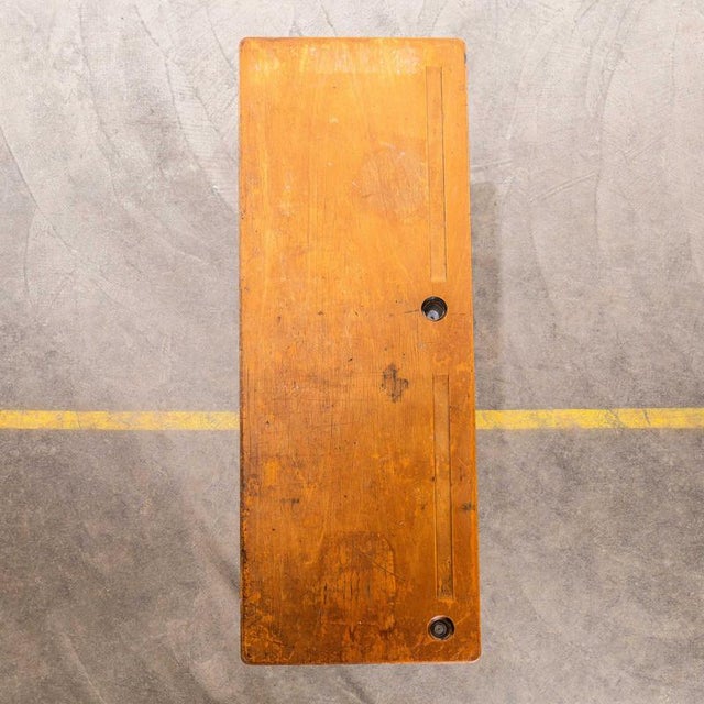 This desk is a classic sixties school desk, tubular metal legs in the classic mullca aqua green with a well used beech top...