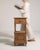 A compact side table combining natural oak with a refined marble surface. The contrast enhances both durability and...