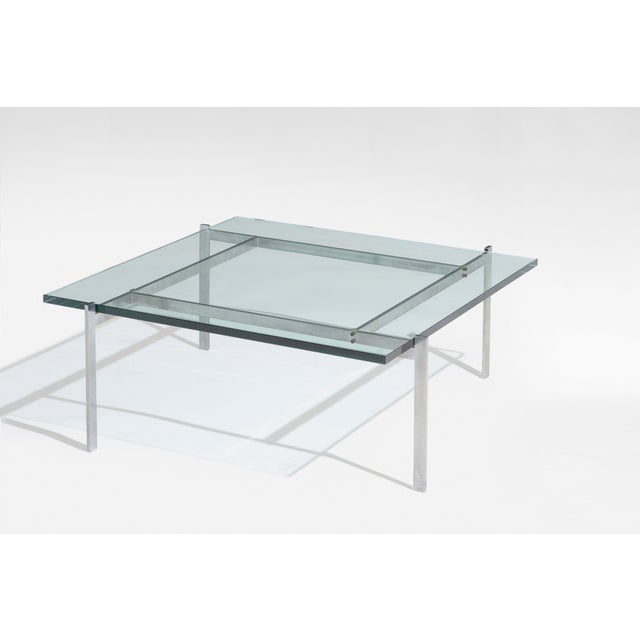 A minimalist masterpiece of Scandinavian modernism, this vintage PK61 Coffee Table by Poul Kjærholm embodies pure...