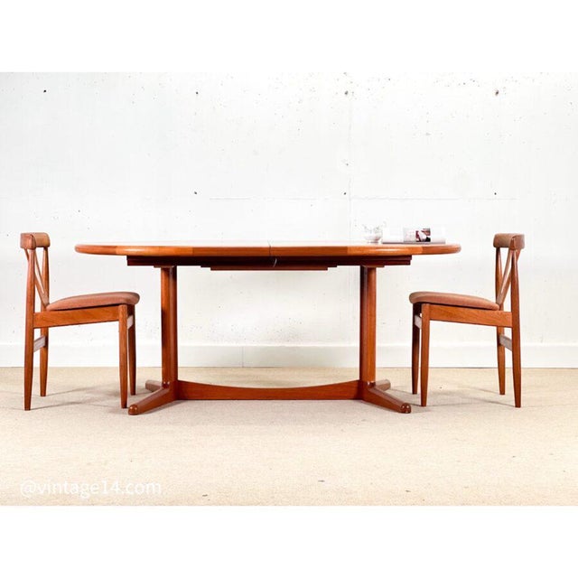 Iconic Extending Dining Table by Laurits M. Larsen – Denmark, 1960s An emblem of Danish craftsmanship and mid-century...