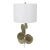 Petal like accents in metal adorn the base of this decorative, handcrafted table lamp. A coordinating finial and shade are...