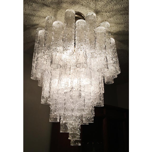 Gorgeous Art Glass fixture from Murano's finest production. This chandelier can be dated between the late 50s and the...