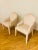 These beautiful chairs have a graceful shape and have been reupholstered in a soft pink velvet. Comfortable and elegant